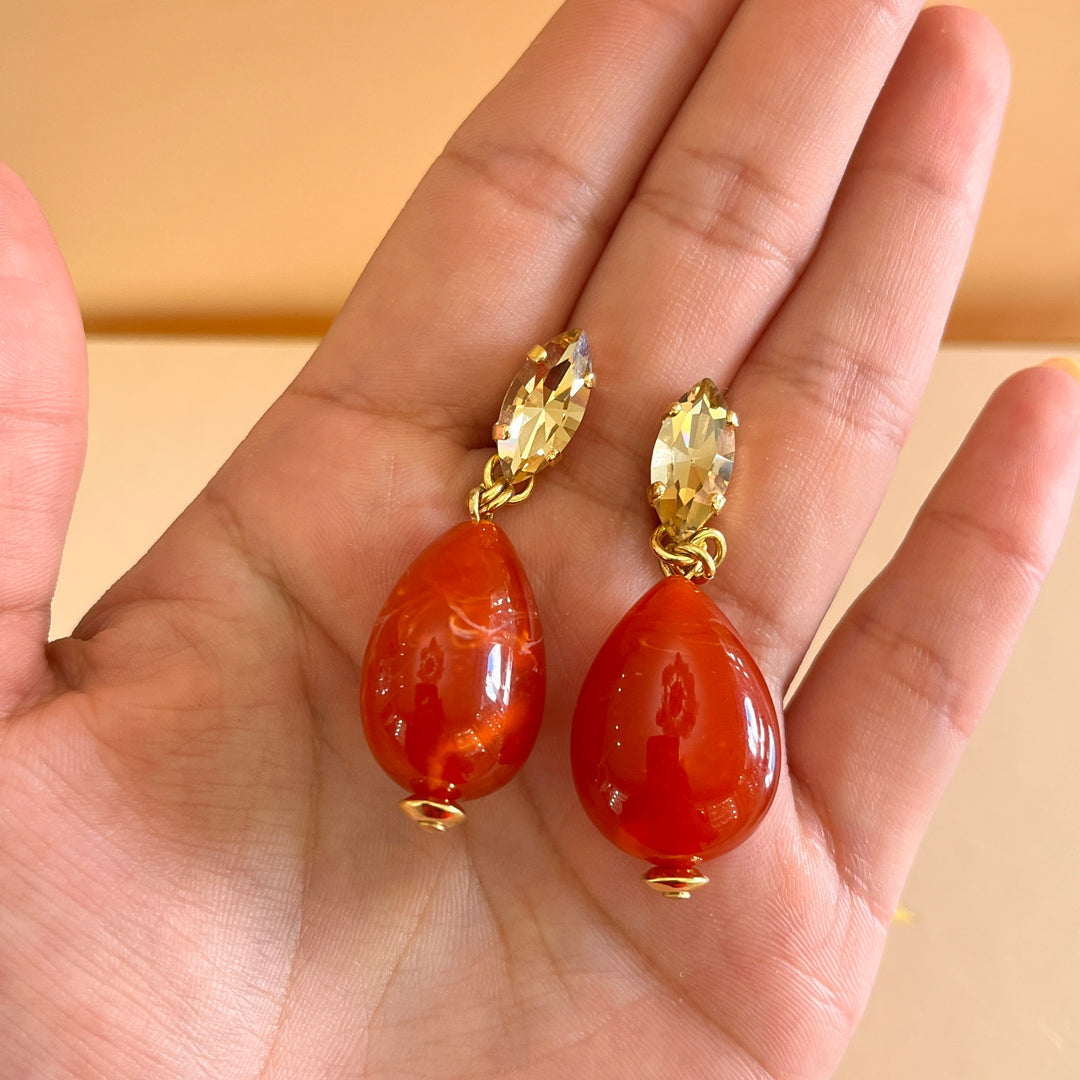 Statement red resin with champagne Swarovski crystals set