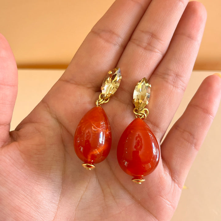 Statement red resin with champagne Swarovski crystals set