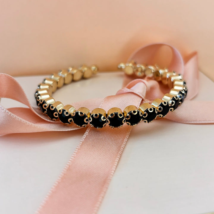 Black rhinestone gold plated bangle