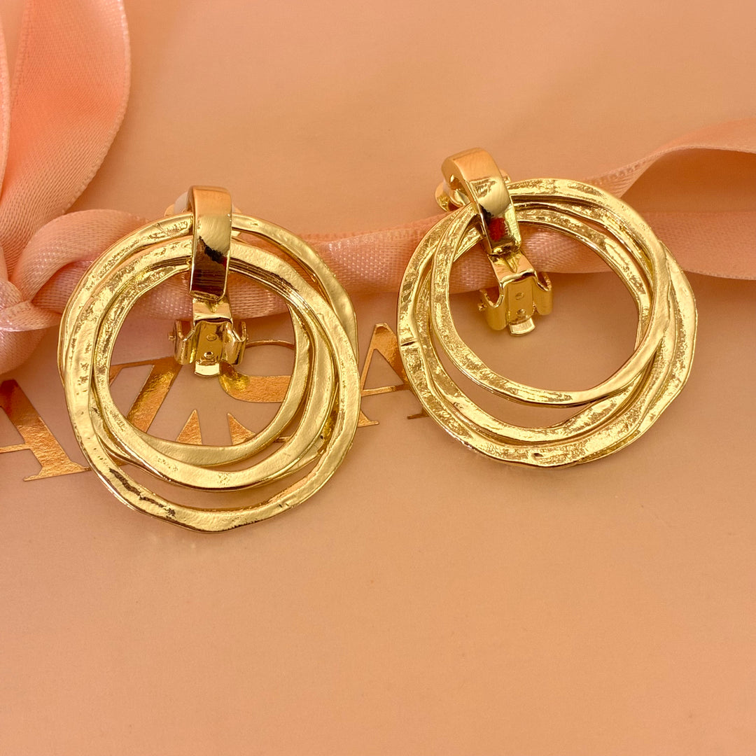 Dangle round clip on earrings