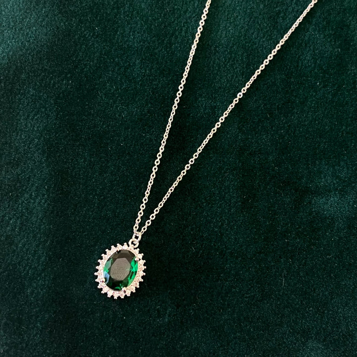 Dark green oval zircone set