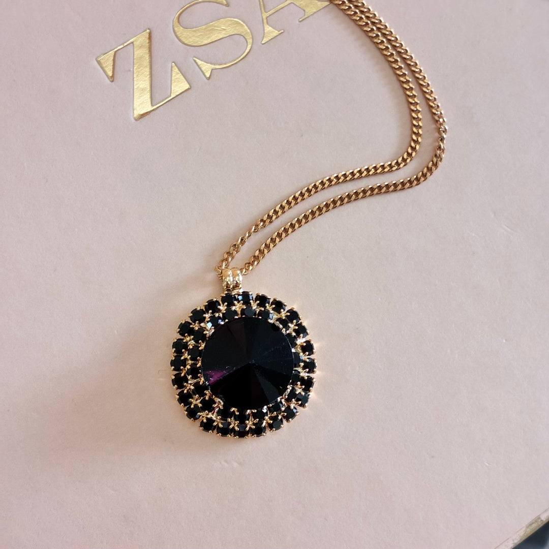 Round black gold plates pendant