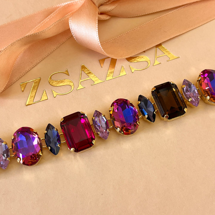 Purple and fuchsia Swarovski crystals earrings and bracelet