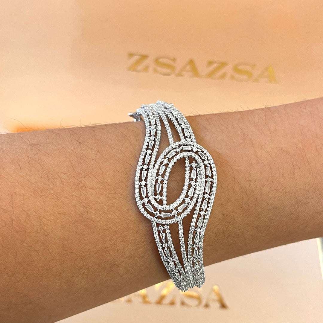 Crossed silver zircone bangle