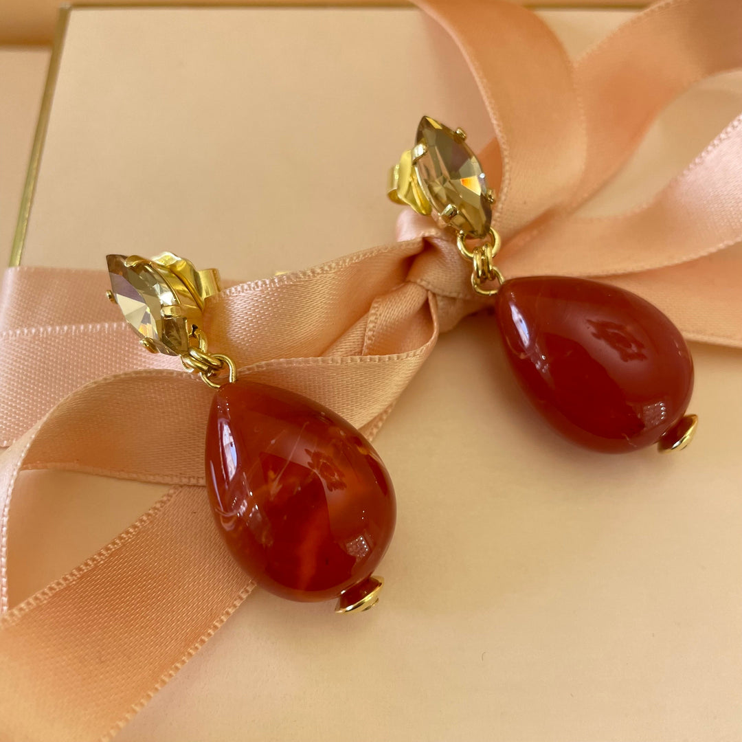 Statement red resin with champagne Swarovski crystals set