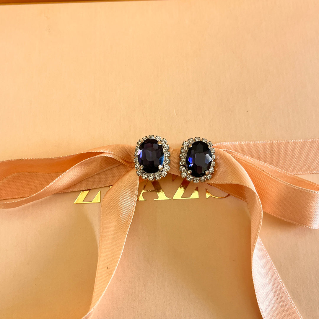 Purple oval preciosa crystals set