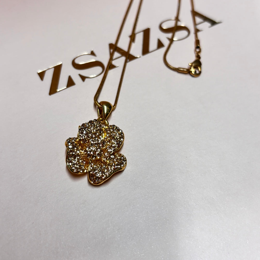 Dainty bronze rhinestone flower pendant