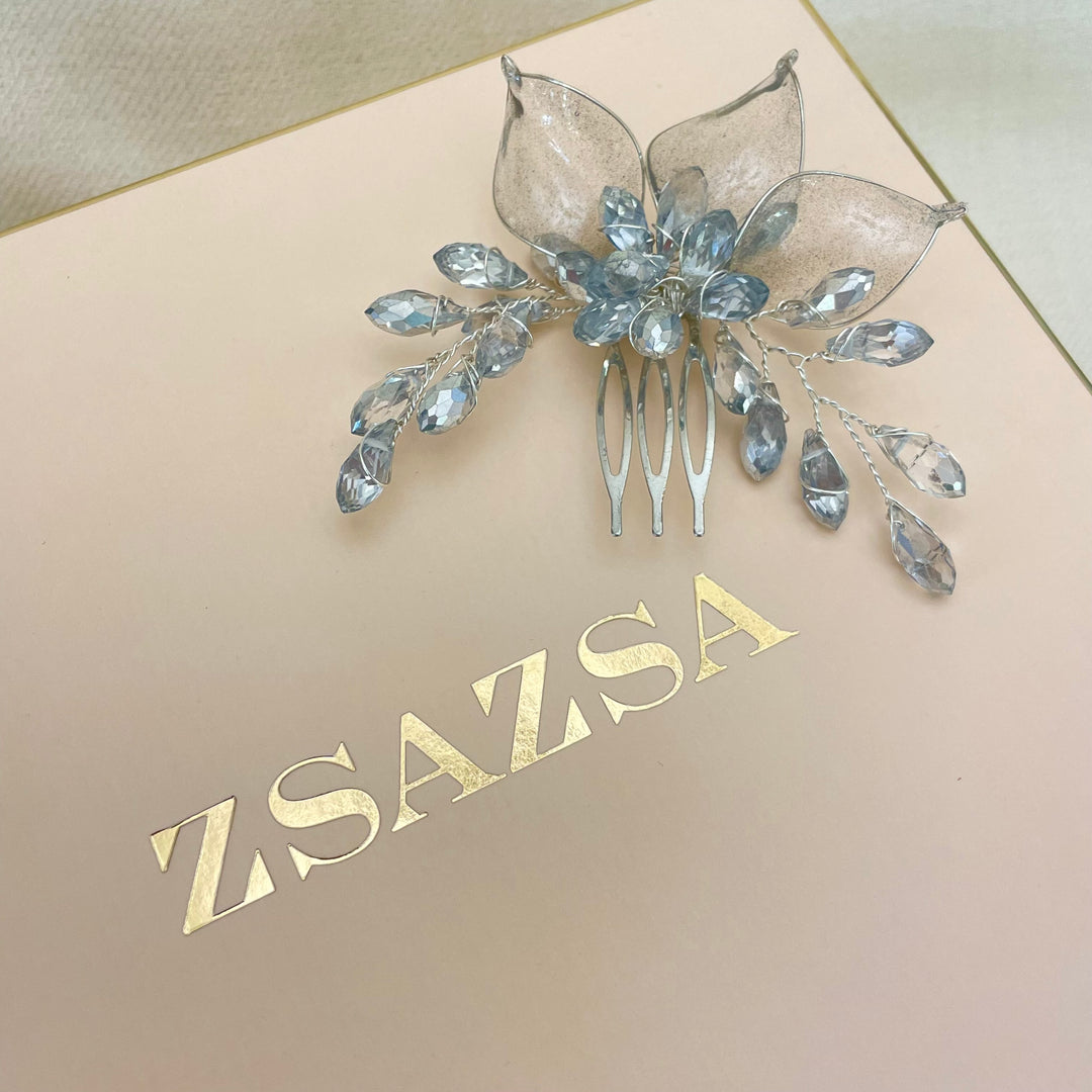 Small silver hair comb