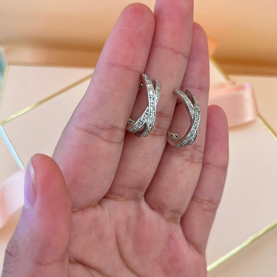 Silver zircone crossed half hoops
