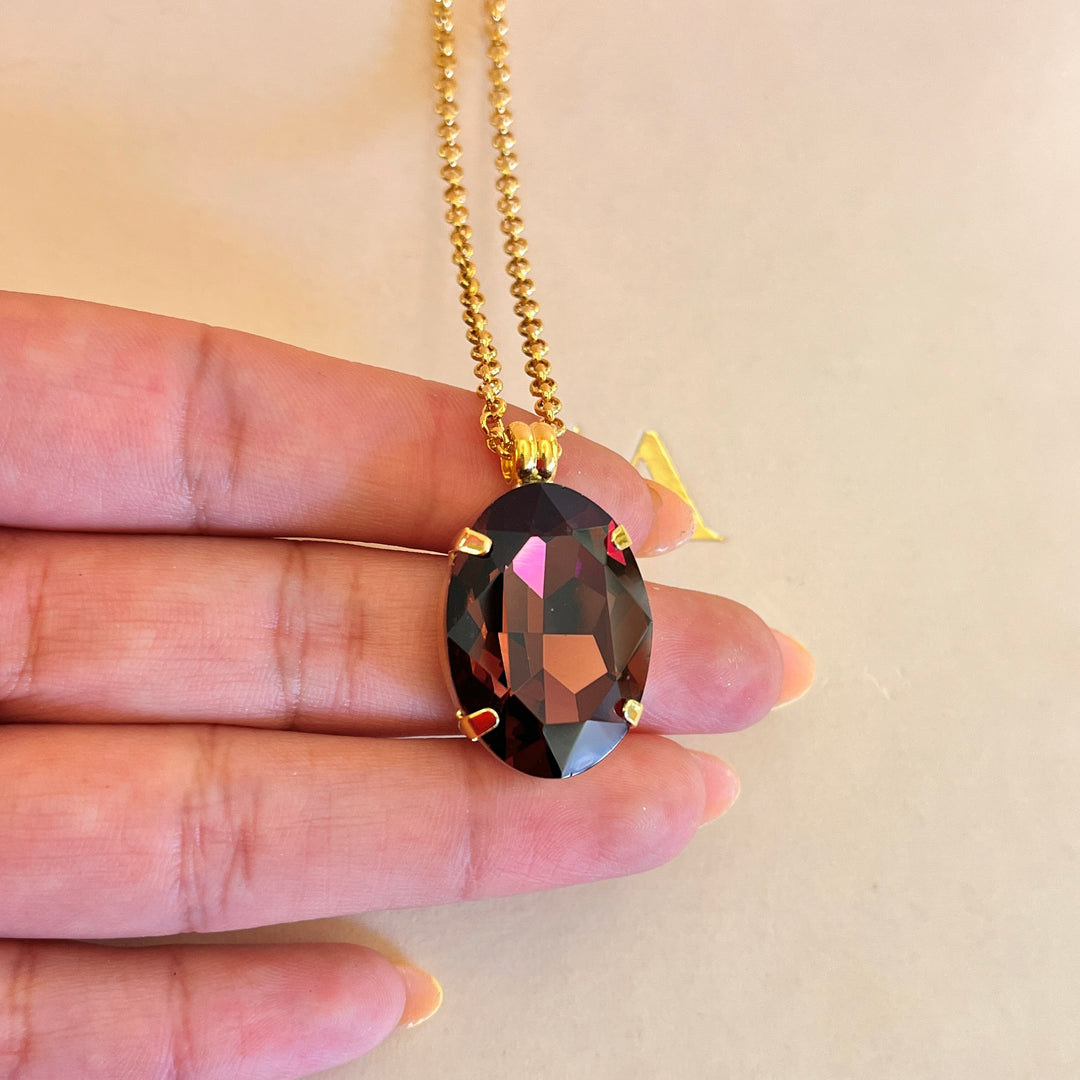 Purple oval preciosa crystal pendant