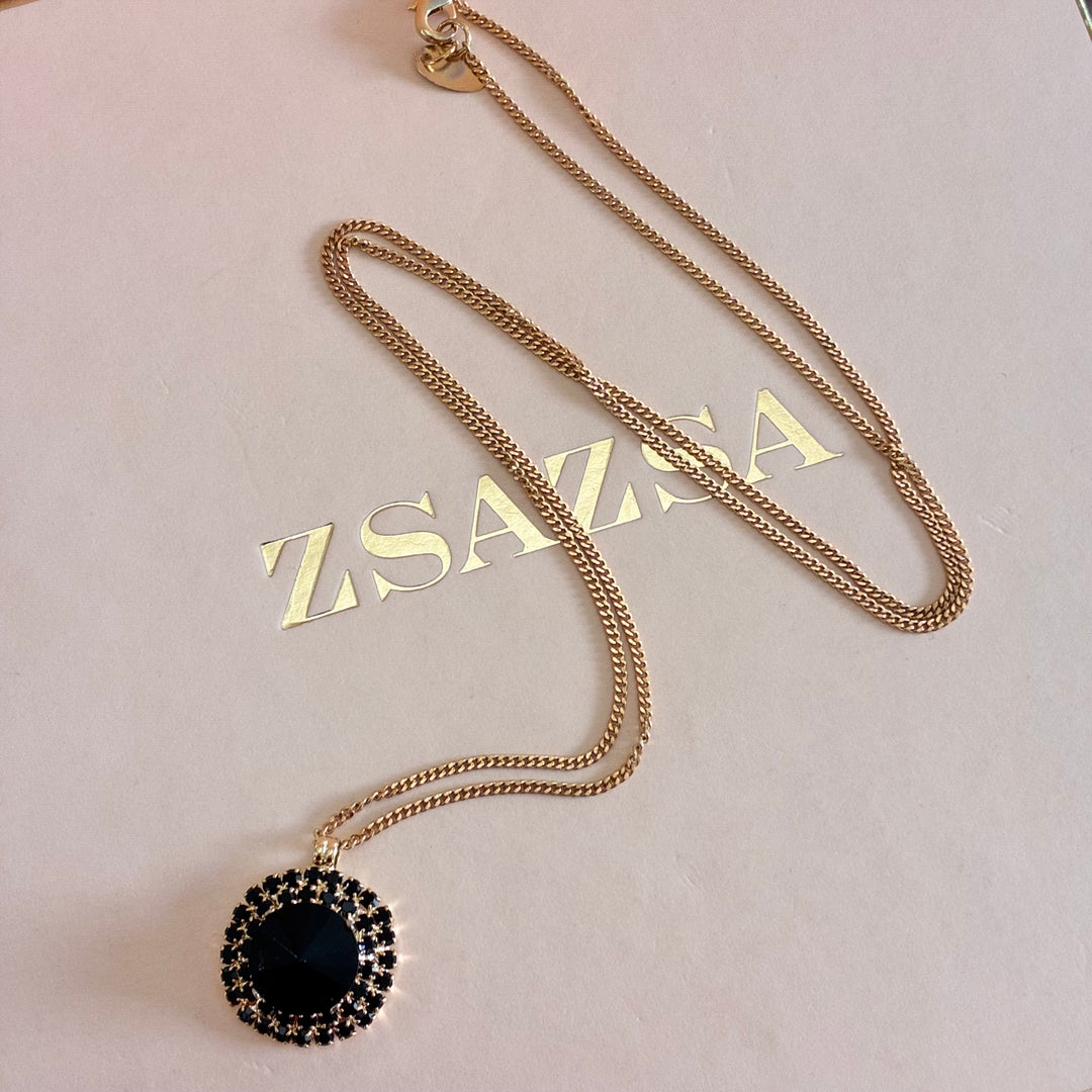 Round black gold plates pendant