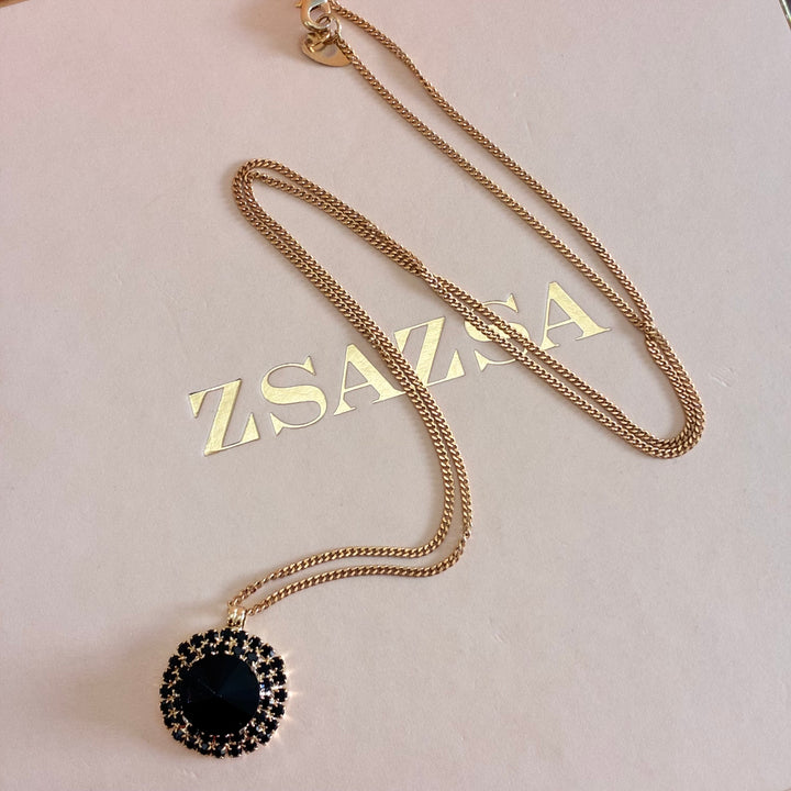 Round black gold plates pendant
