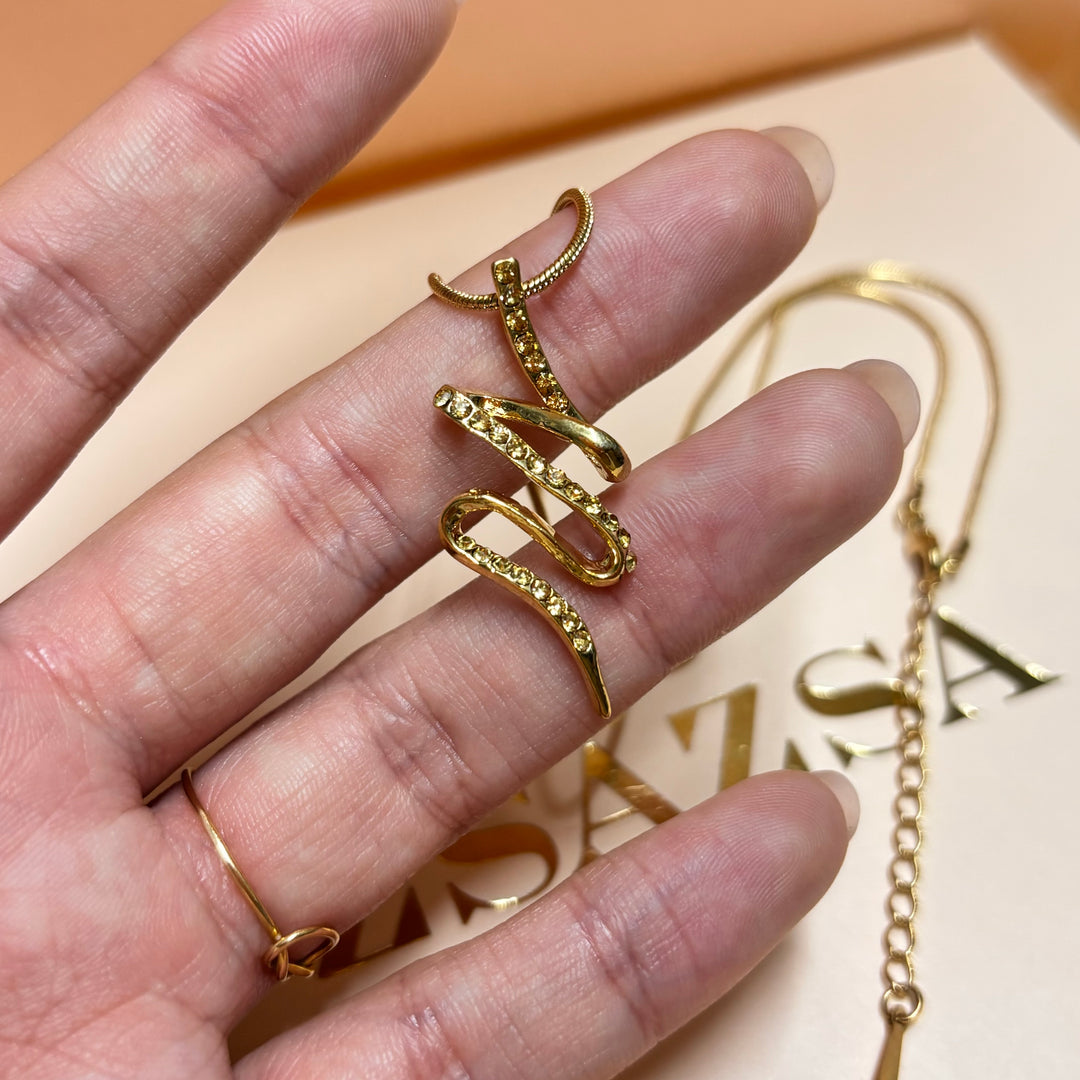 Bronze rhinestone gold plated pendant