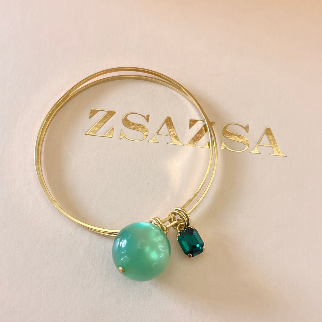 Dark green Swarovski crystal bangle with light green ball