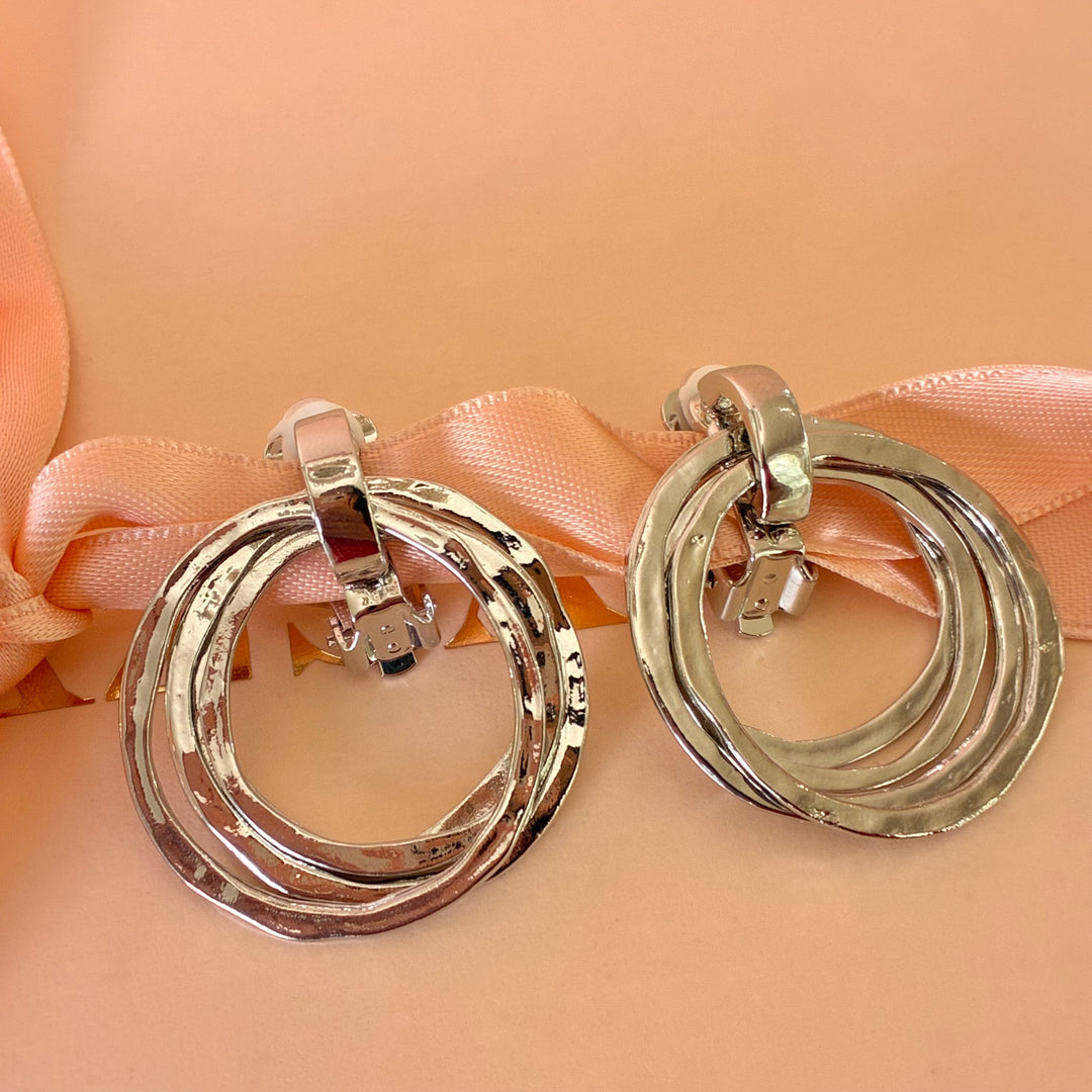 Dangle round clip on earrings