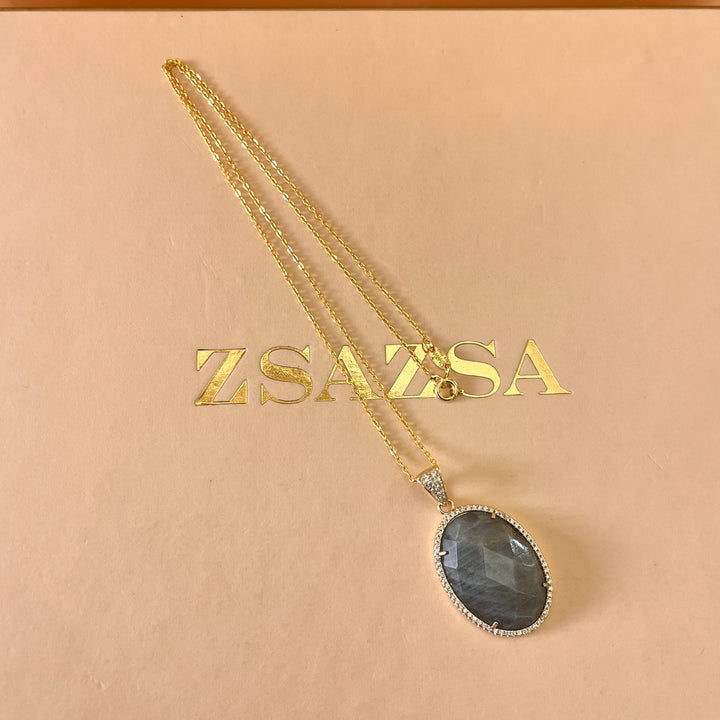 Grey semi precious stone and zircone set