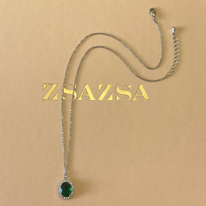 Dark green oval zircone set