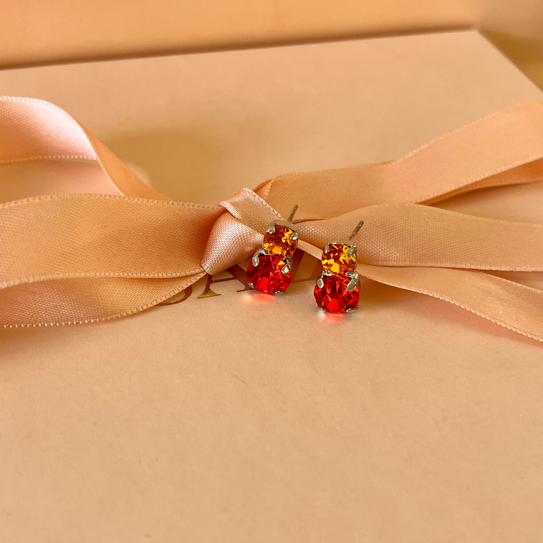 Orange Swarovski crystals studs