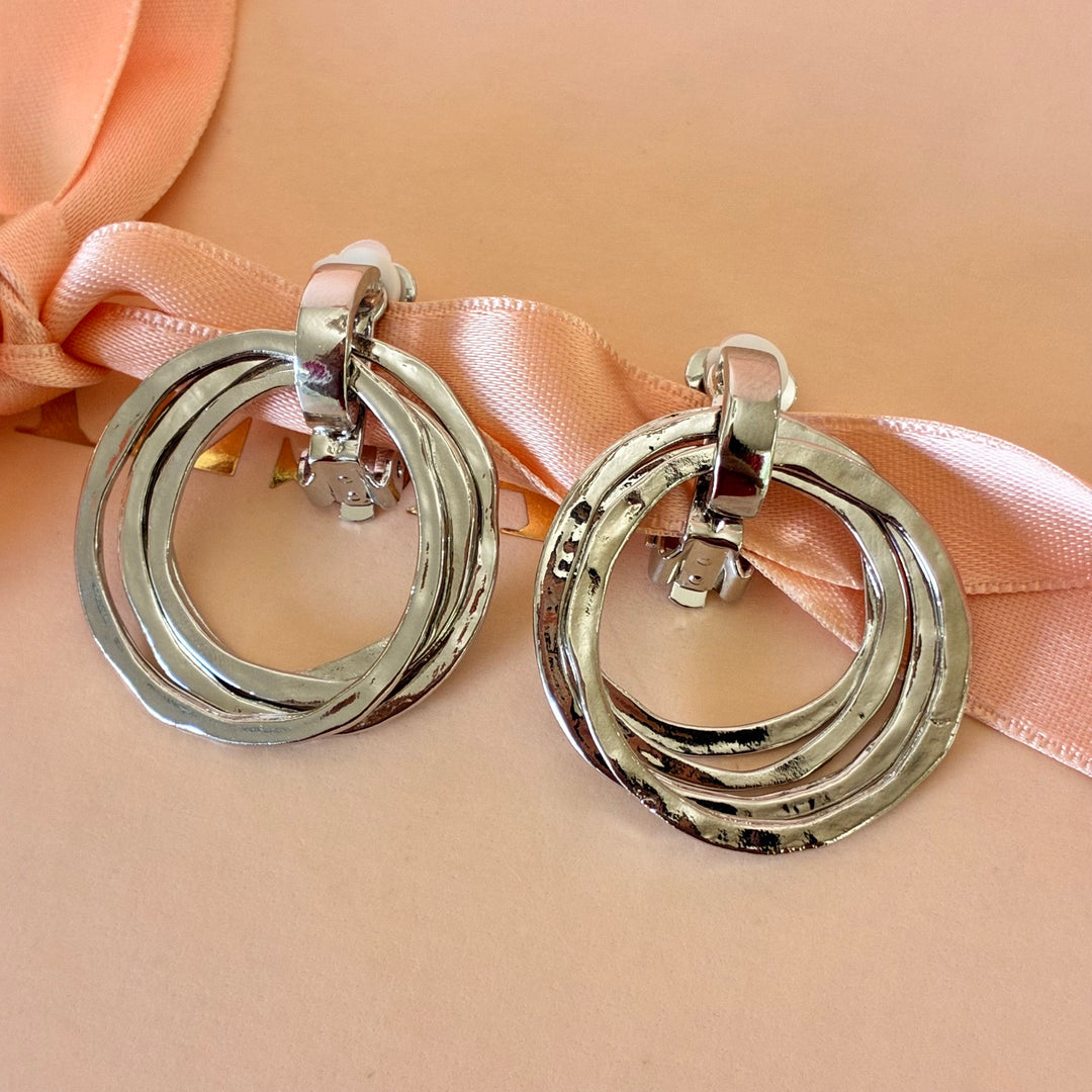 Dangle round clip on earrings