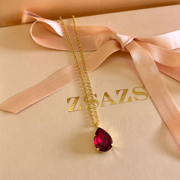 Dark red teardrop Preciosa crystals set