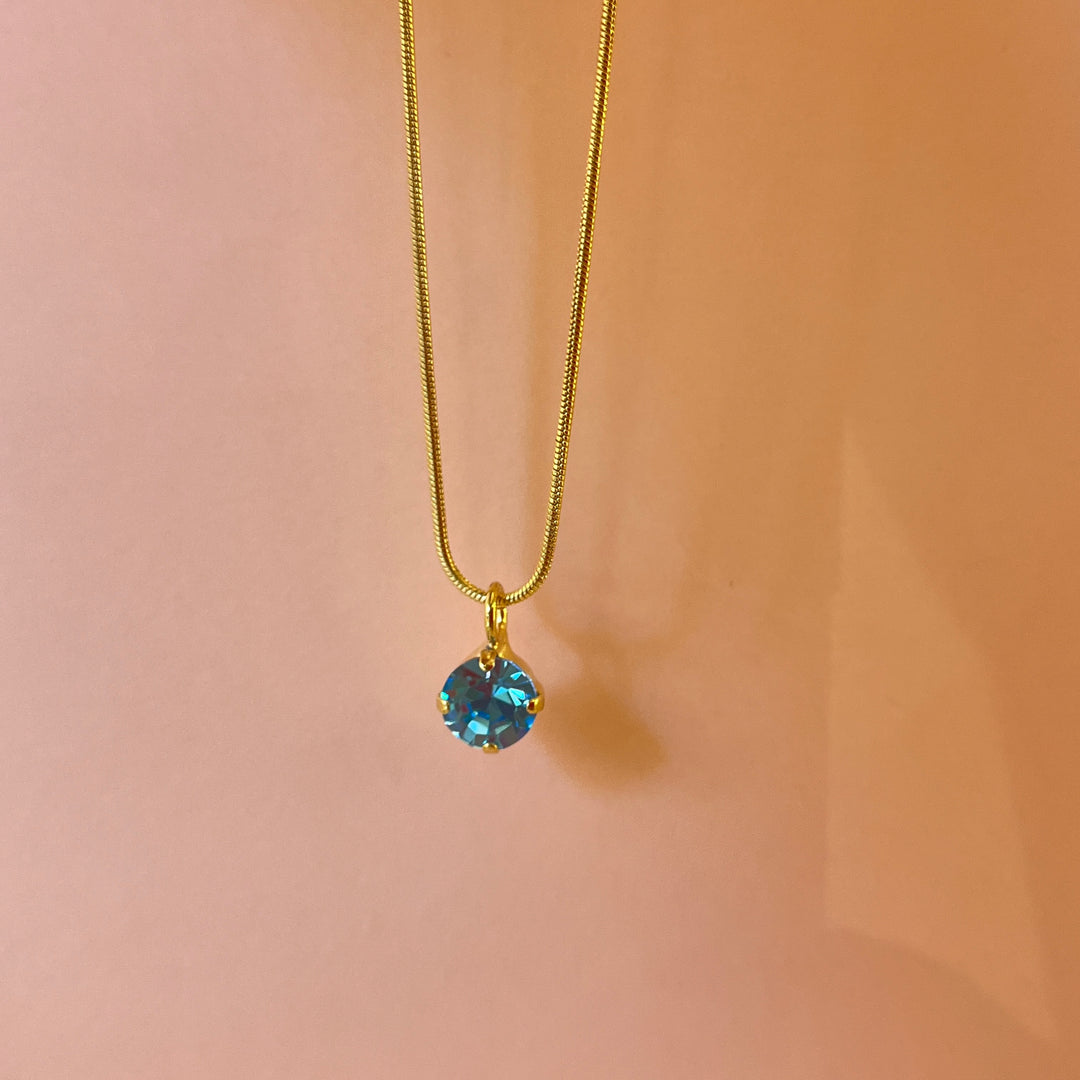 Turquoise round Swarovski crystal pendant