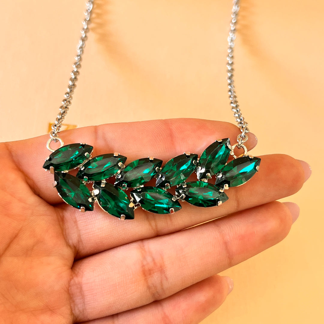Dark green marquise preciosa crystals set