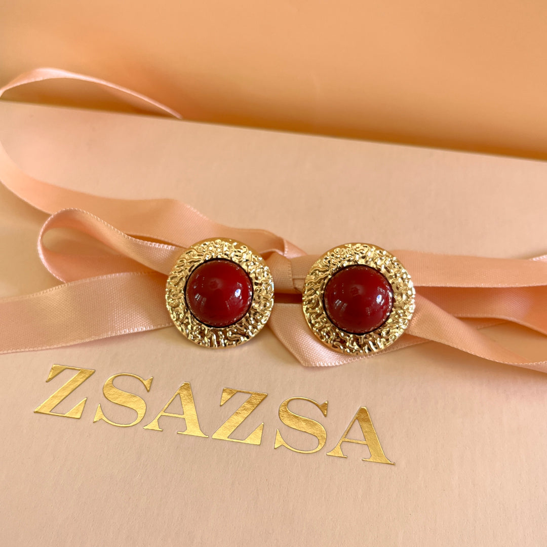 Dark red resin studs