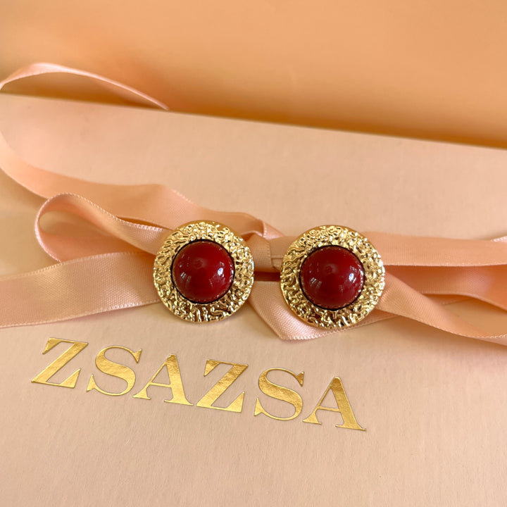 Dark red resin studs