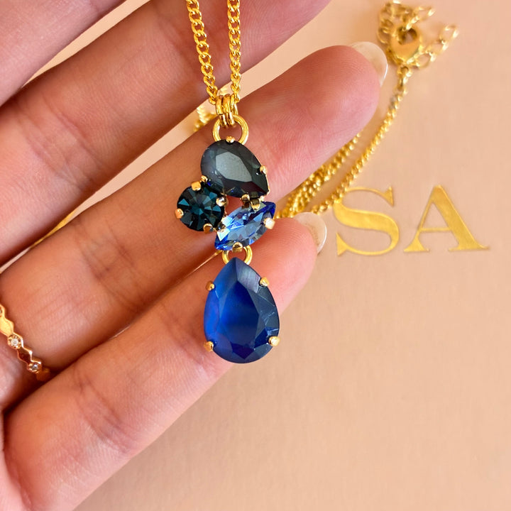 Mixed blue and shapes gold plated pendant
