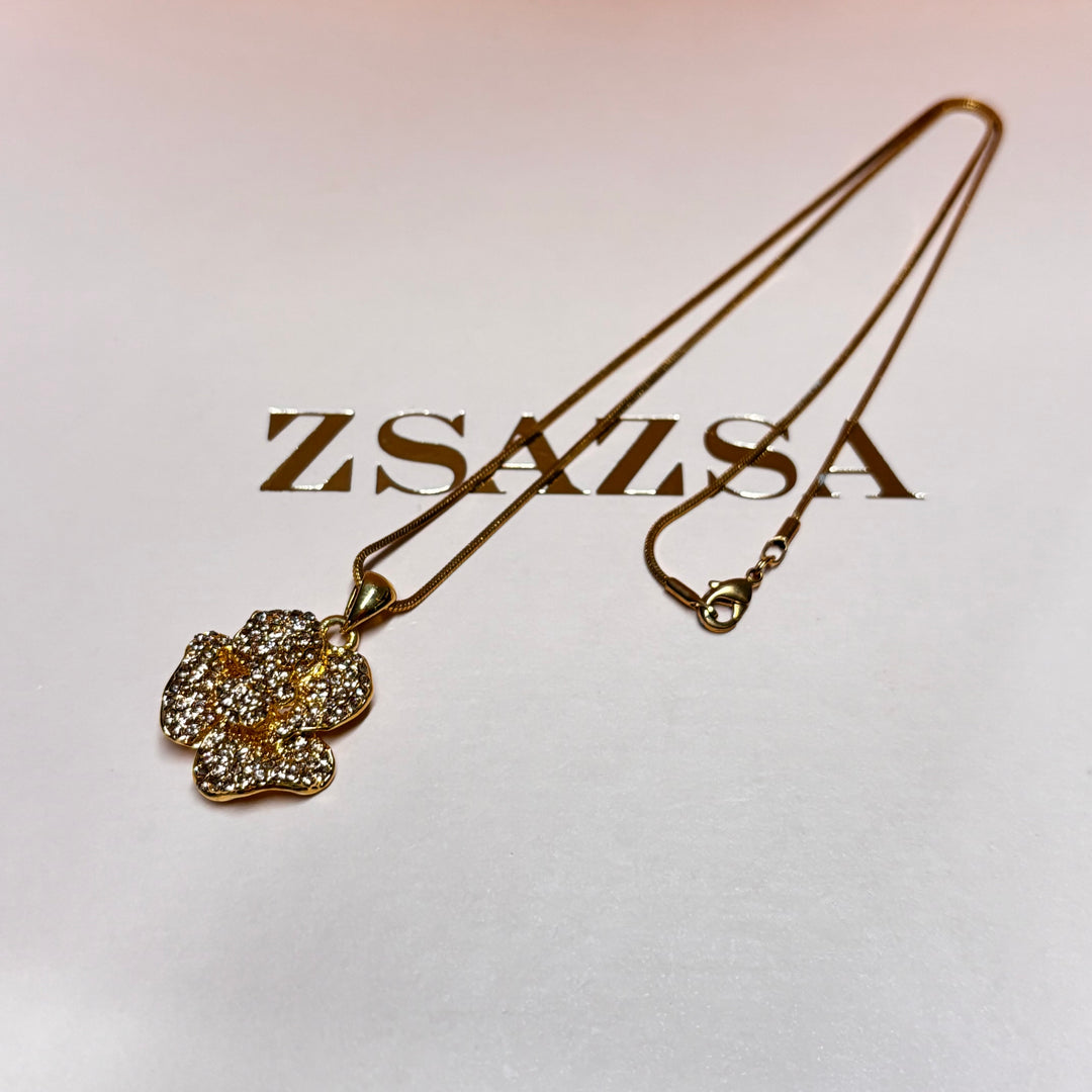 Dainty bronze rhinestone flower pendant