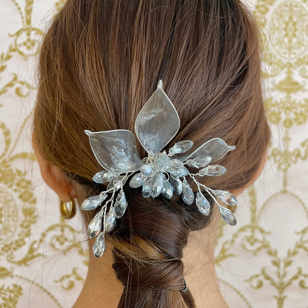 Small silver hair comb