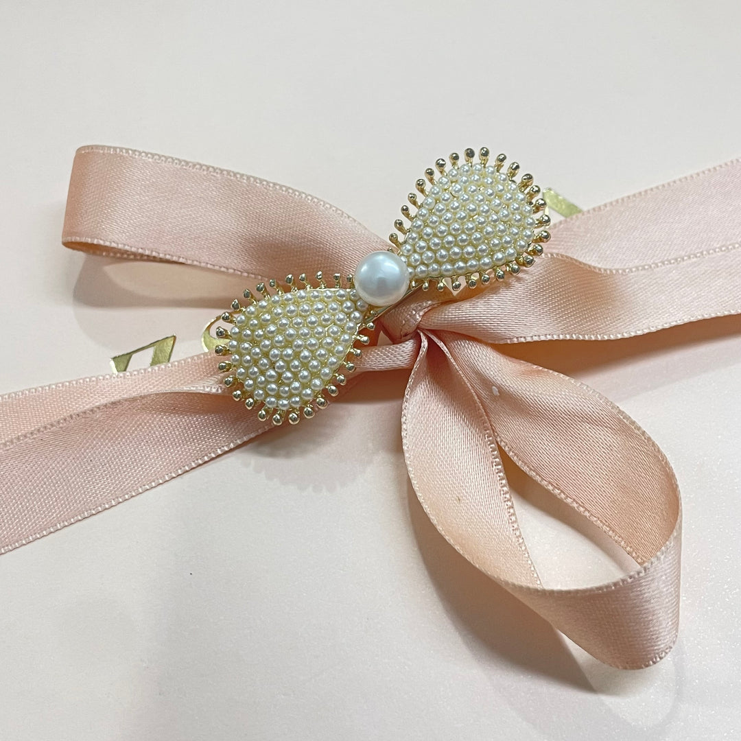 Bow pearl hair clip