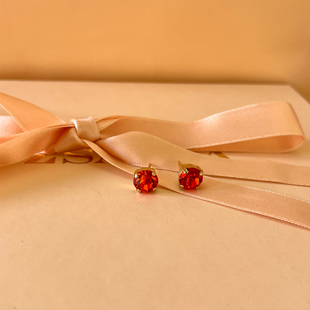 Orange Swarovski crystals studs