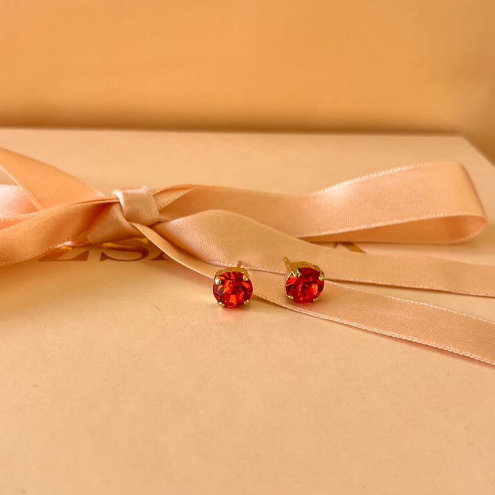 Orange Swarovski crystals studs