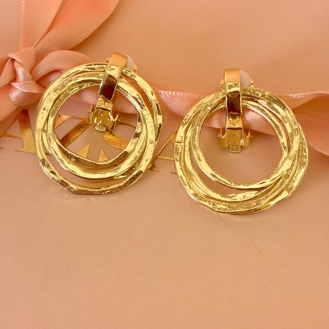 Dangle round clip on earrings