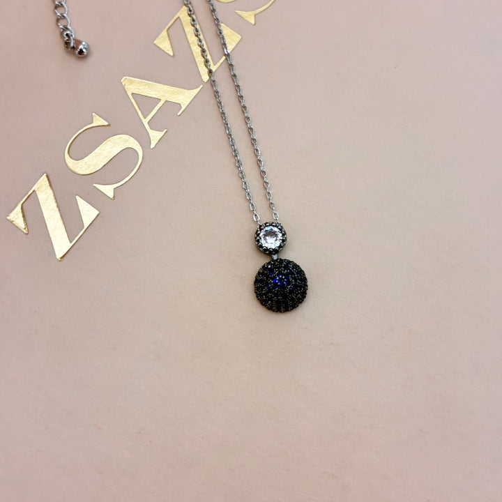 Dainty navy blue zircone pendant