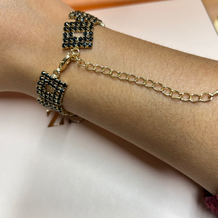 Black rhinestone squeares gold bracelet