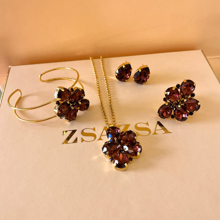 Purple teardrop preciosa crystals set