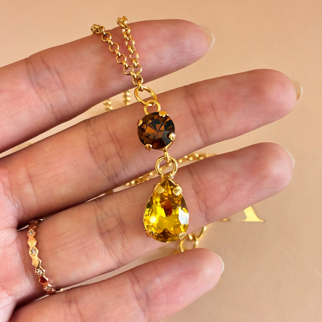 Brown and yellow Preciosa crystals set