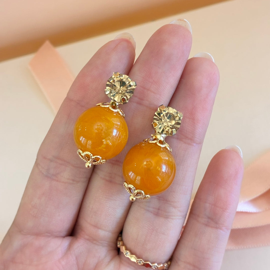 Bronze and orange Preciosa crystals studs