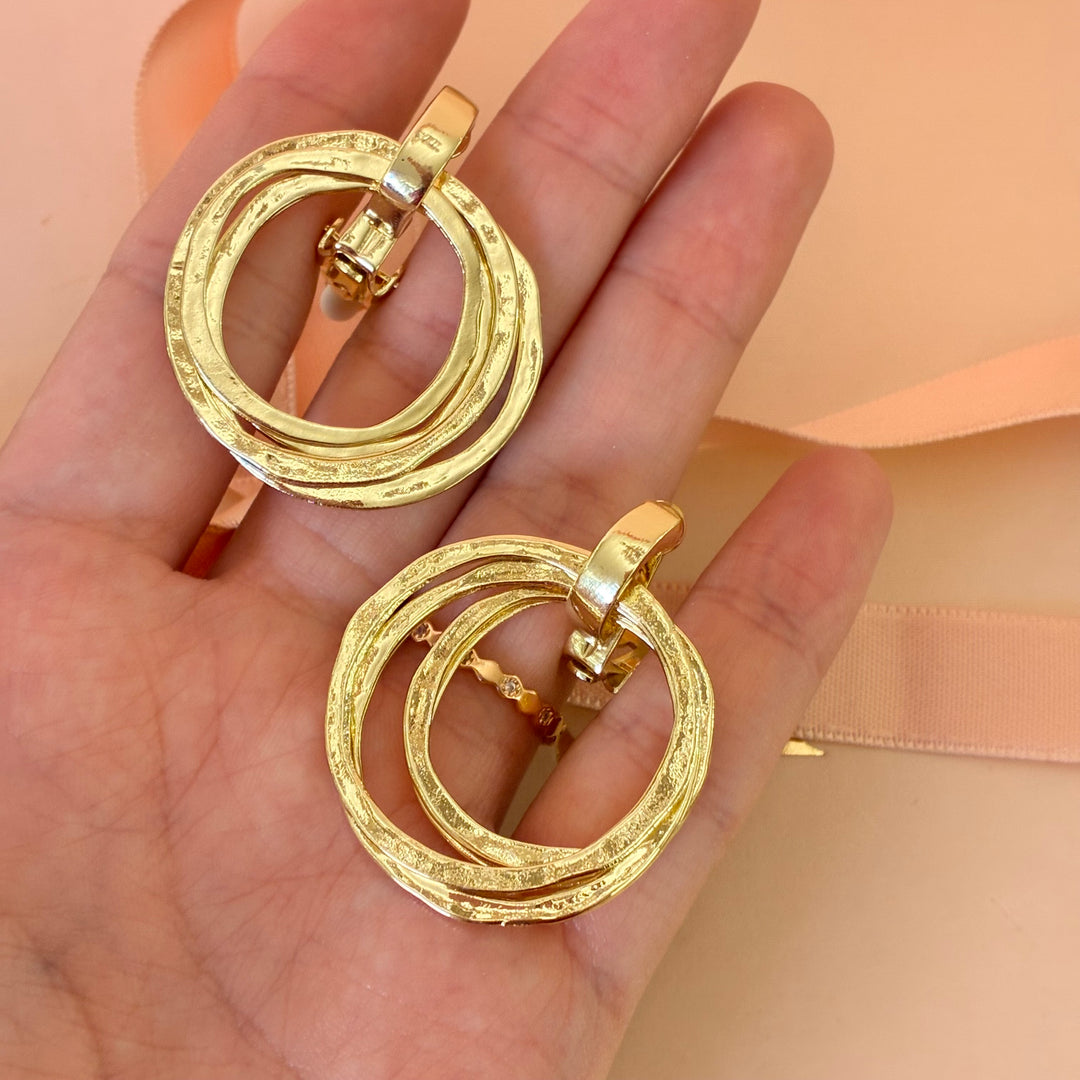 Dangle round clip on earrings