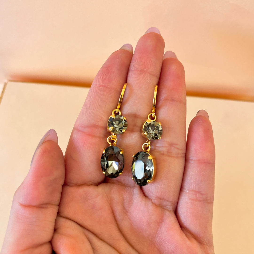 Grey oval and round preciosa crystals set