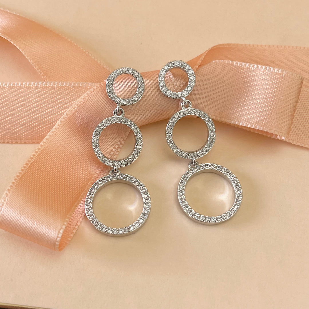 Silver zircone triple round earrings