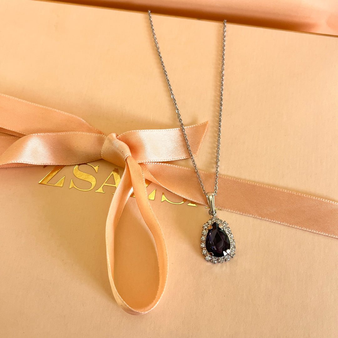 Purple teardrop preciosa crystals set