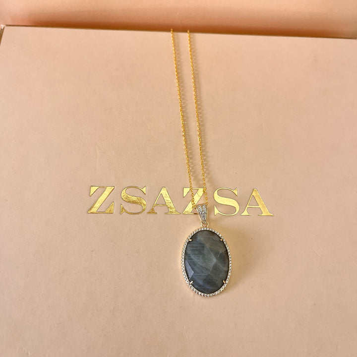 Grey semi precious stone and zircone set