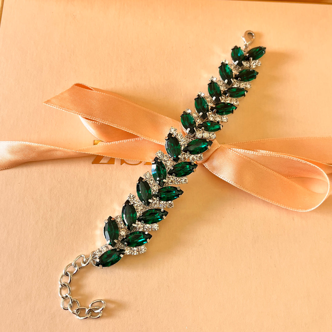 Dark green marquise preciosa crystals set