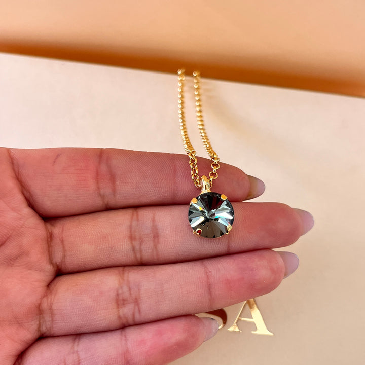 Grey round preciosa crystals set