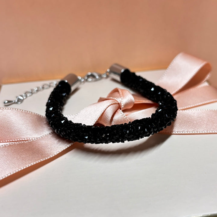 Black beads white gold plated bracelet