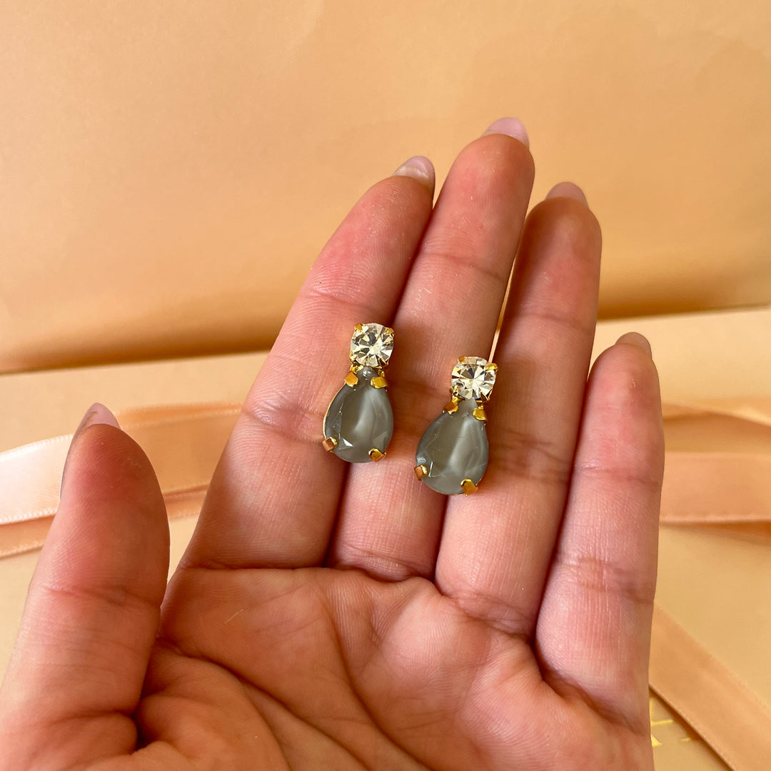 Light grey teardrop preciosa crystals studs