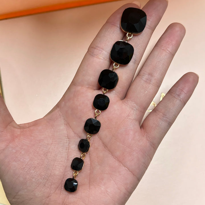 Long black rhinestone gold earrings